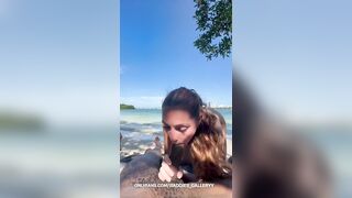 Ashley Aoky gets naughty on public beach & sucks off random dudes